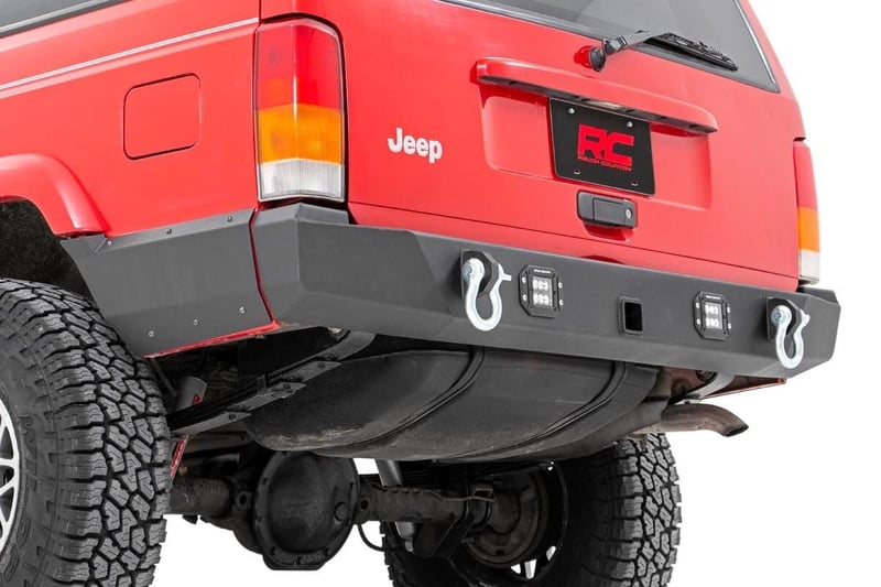 RC REAR BUMPER W/LIGHTS & SHACKLES JEEP XJ 84-01