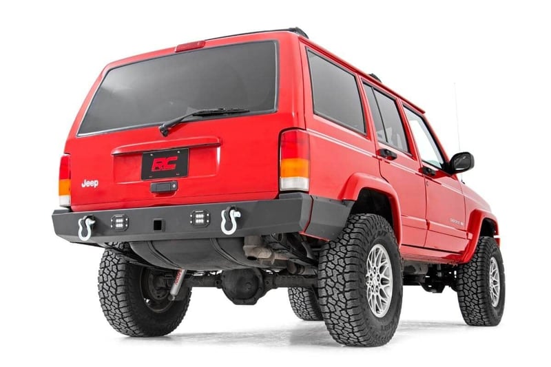 RC REAR BUMPER W/LIGHTS & SHACKLES JEEP XJ 84-01